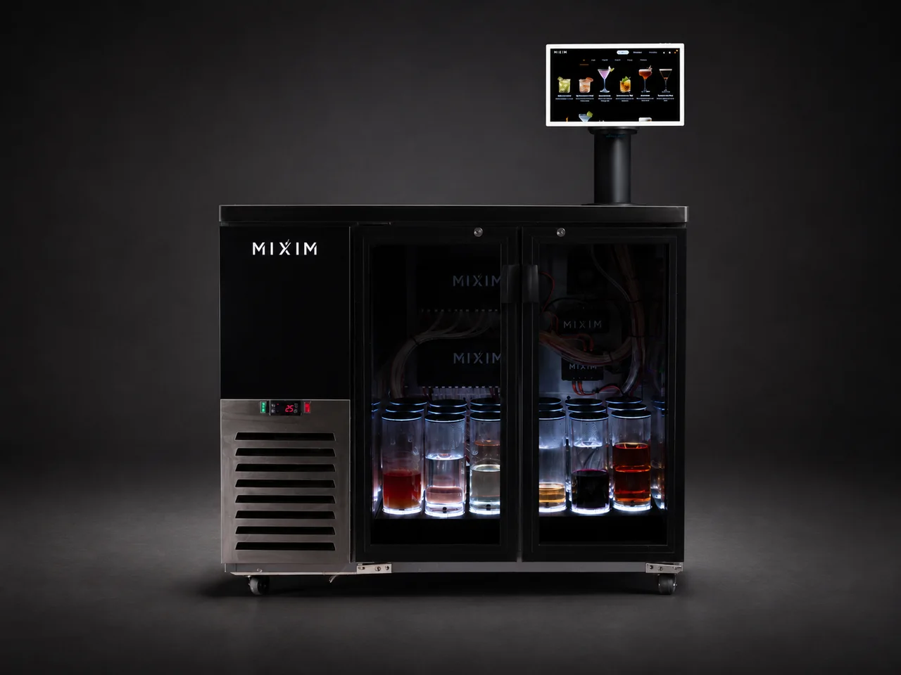 The Mixim Commercial head-on, both glass doors lit over the ingredient containers